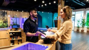 customer paying at dispensary